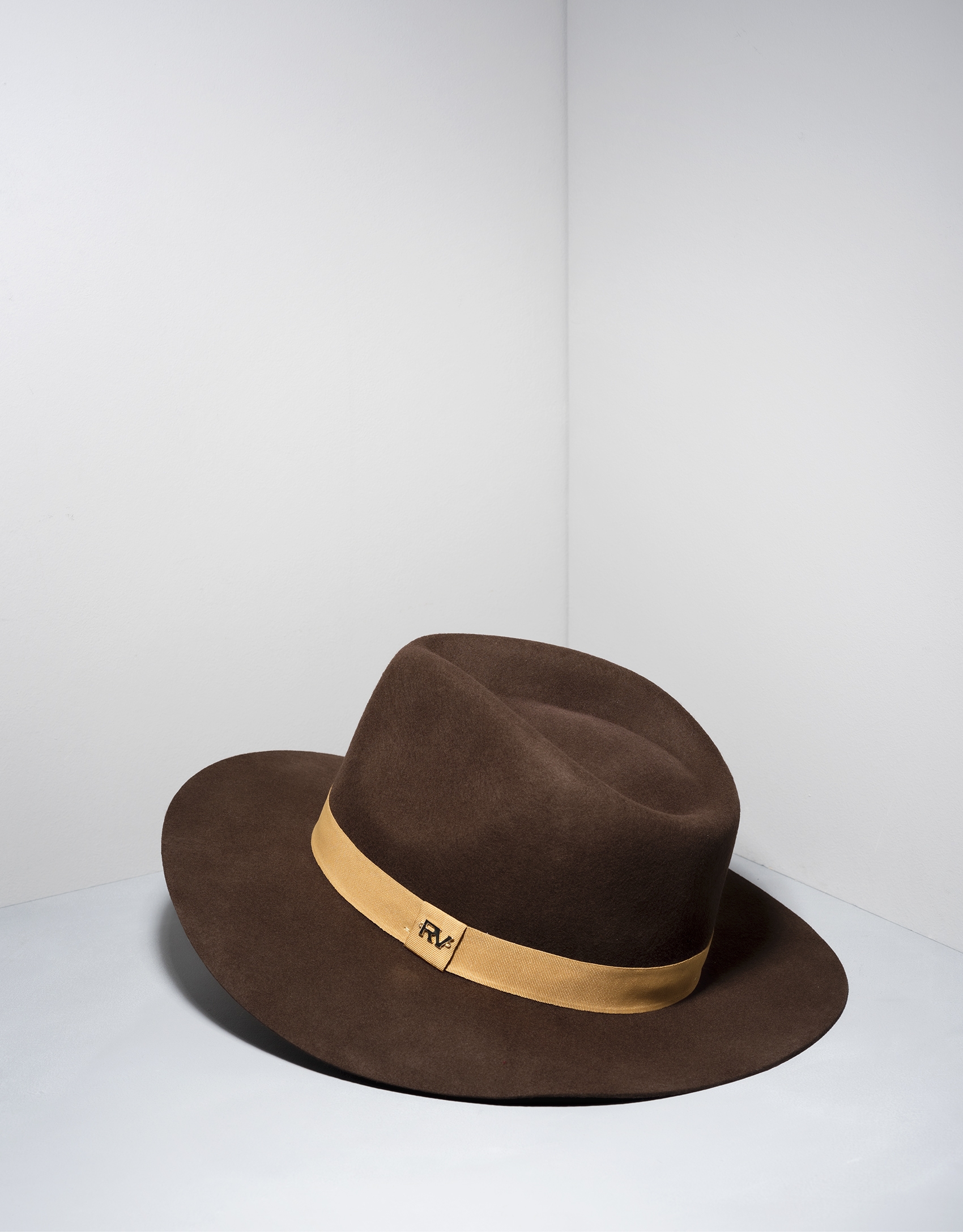 Brown wool fedora hat with beige ribbon