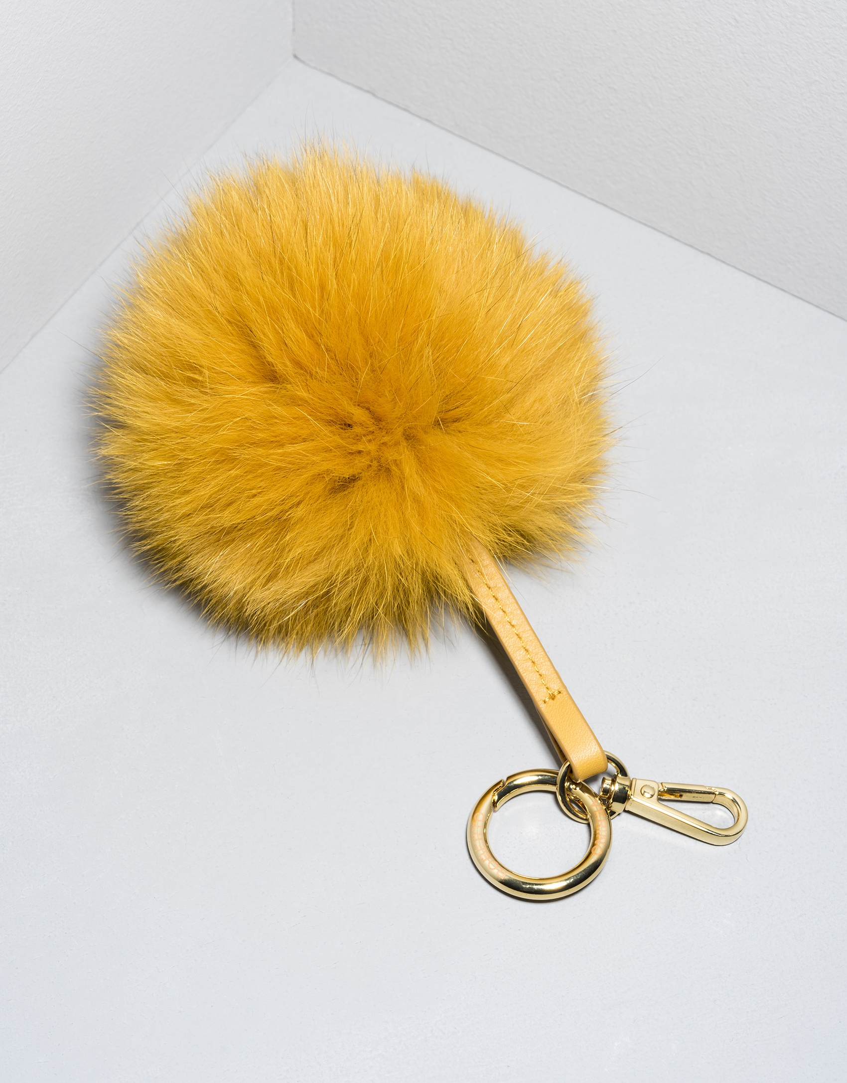 Mustard pompom charm