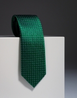 Green silk tie with ivory design