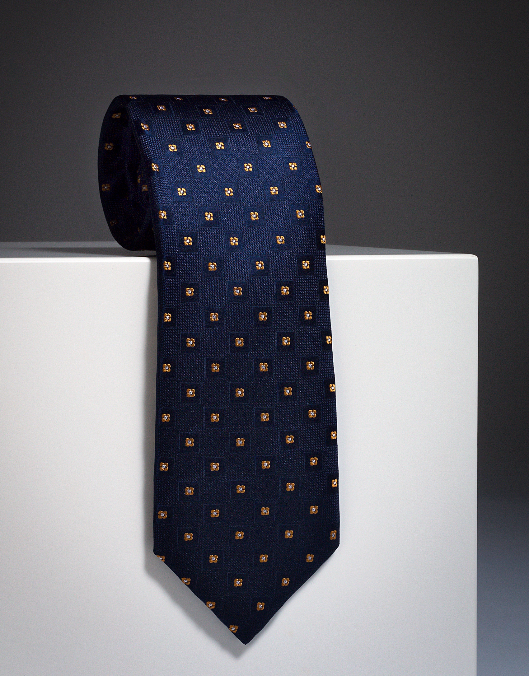 Navy blue tie with yellow checks