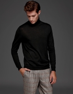 Black turtle neck sweater