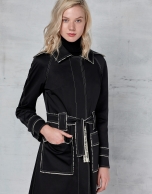 Black trench coat with white stitching