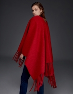 Red poncho with fringe