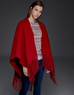 Red poncho with fringe