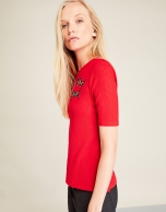 Red t-shirt with fish print