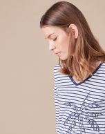 Blue striped top with palm tree