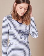 Blue striped top with palm tree