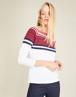 White top with red stripes