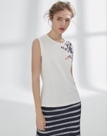 White top with flower embroidery