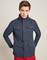 Navy blue parka with four pockets