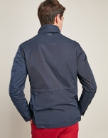 Navy blue parka with four pockets