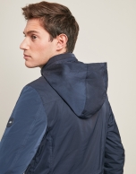 Navy blue parka with four pockets