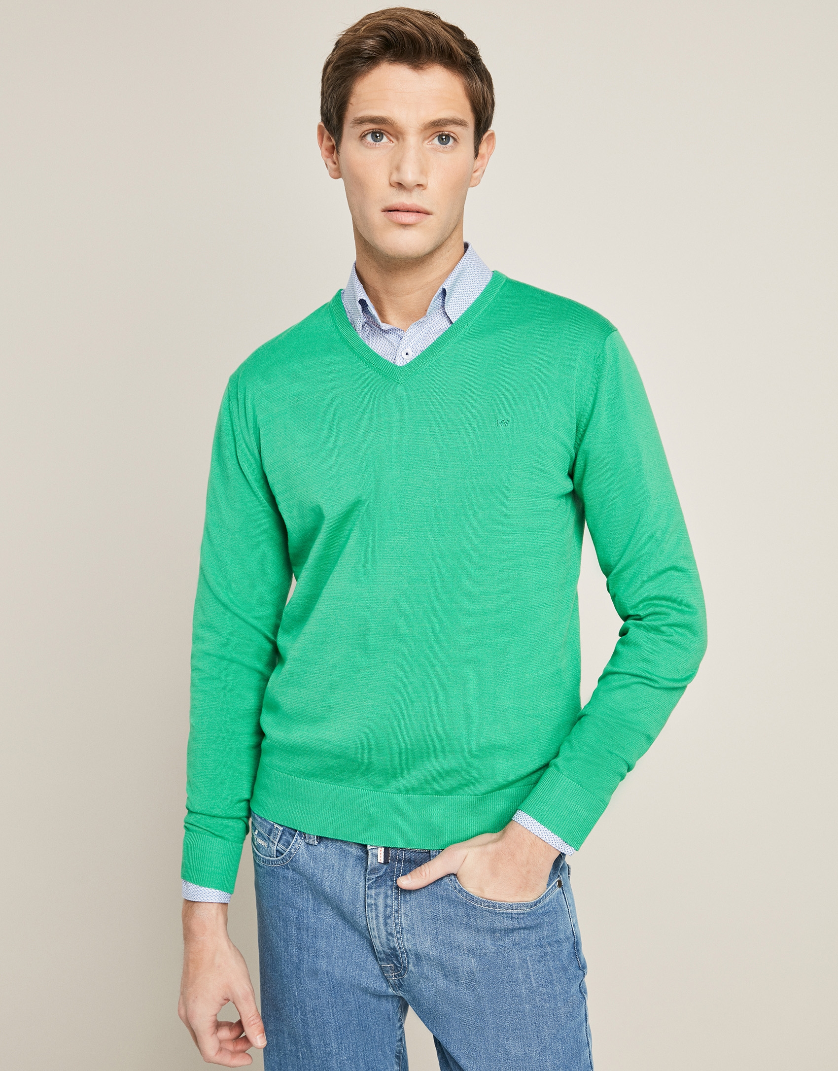 Green V-neck sweater