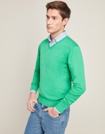 Green V-neck sweater