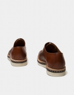 Brown square embossed shoes