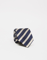 Navy blue silk tie with white/yellow stripes