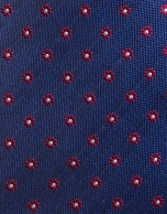 Blue silk tie with red jacquard daisies