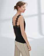 Black top with lace appliqué 