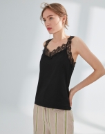 Black top with lace appliqué 