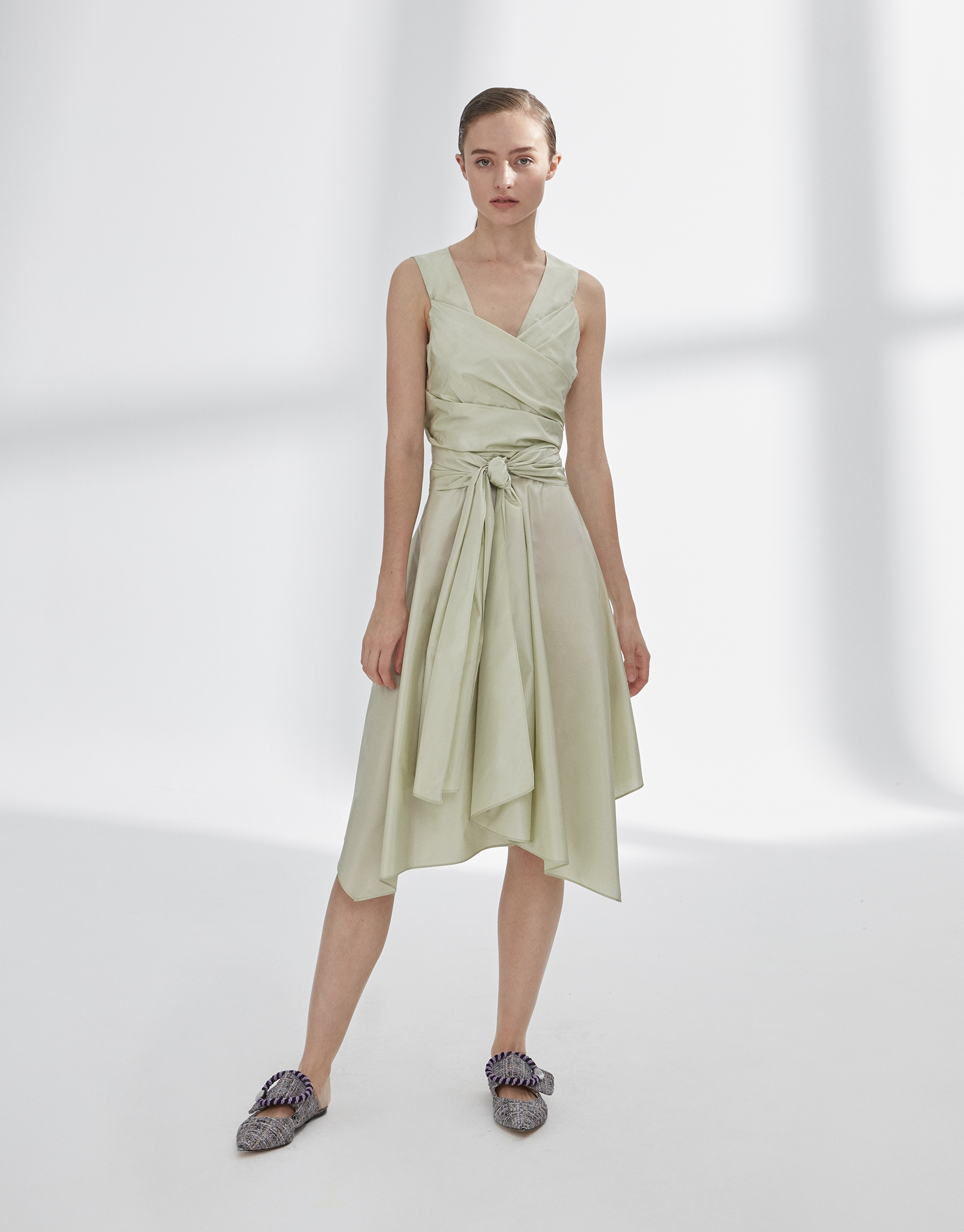 Green draped flowing dress