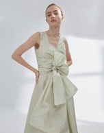 Green draped flowing dress