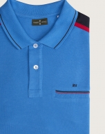 Blue polo with striped shoulders