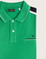 Green polo with striped shoulders