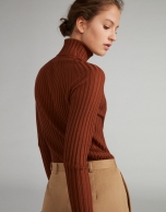 Mink-colored ribbed sweater with turtle neck