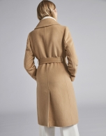 Beige cloth coat with triple row of  buttons