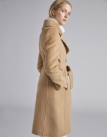 Beige cloth coat with triple row of  buttons