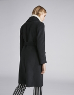 Black cloth coat with triple row of  buttons