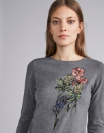 Steel-colored top with floral embroidered print