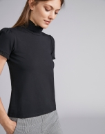 Black short-sleeved top with stovepipe collar