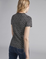 Black top with signature print