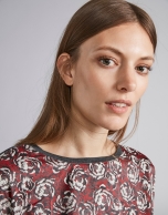 Steel-colored top with floral print