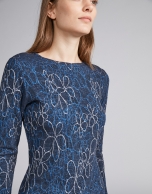 Navy blue knit top with floral print