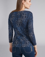 Navy blue knit top with floral print