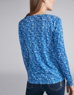 Blue knit top with decoration