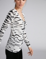 Silver knit top with zebra design