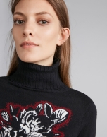 Black sweater with floral jacquard and mock turtleneck