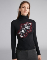 Black sweater with floral jacquard and mock turtleneck