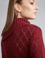 Scarlet openwork sweater with asymmetric collar