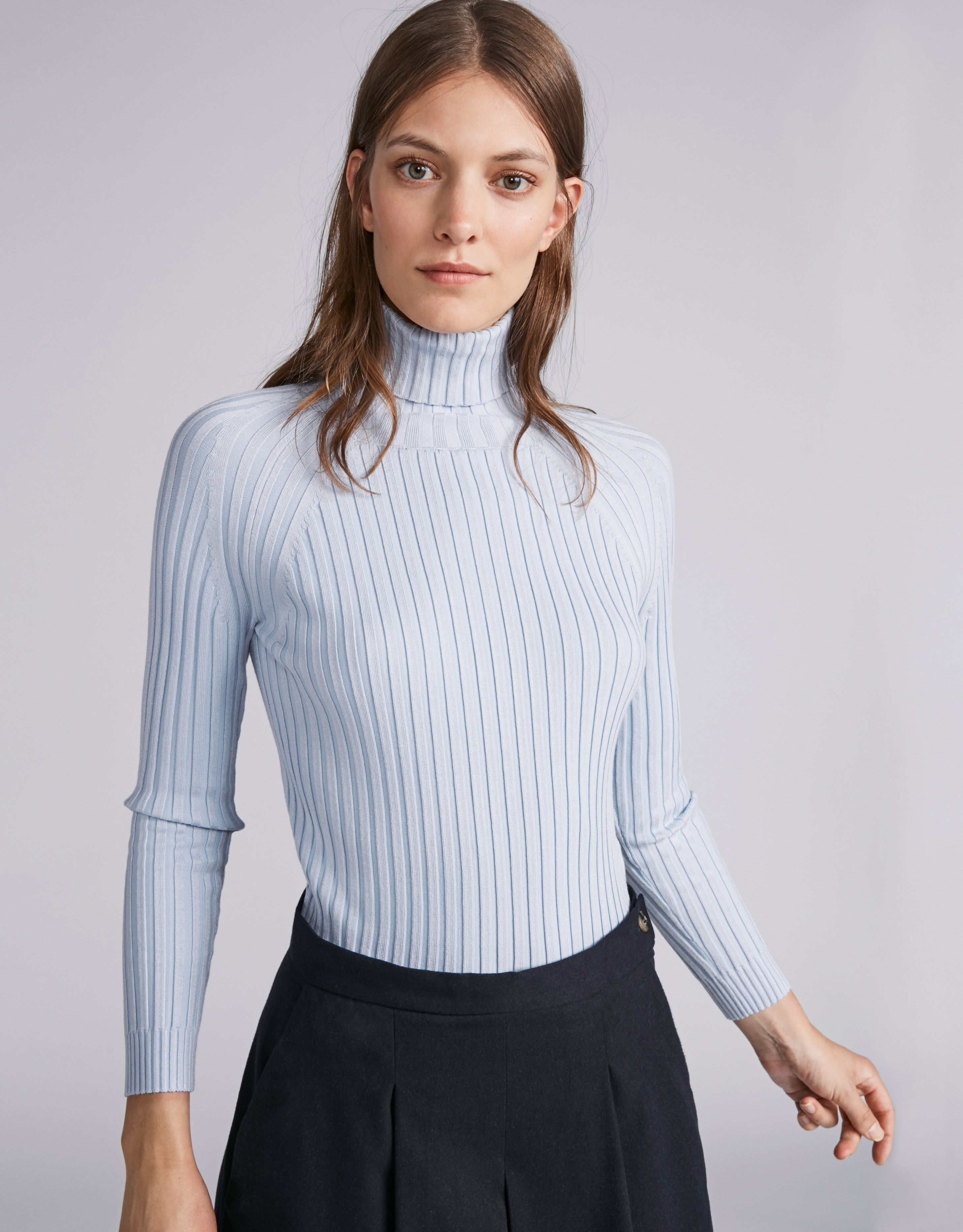 Light blue ribbed sweater with turtle neck