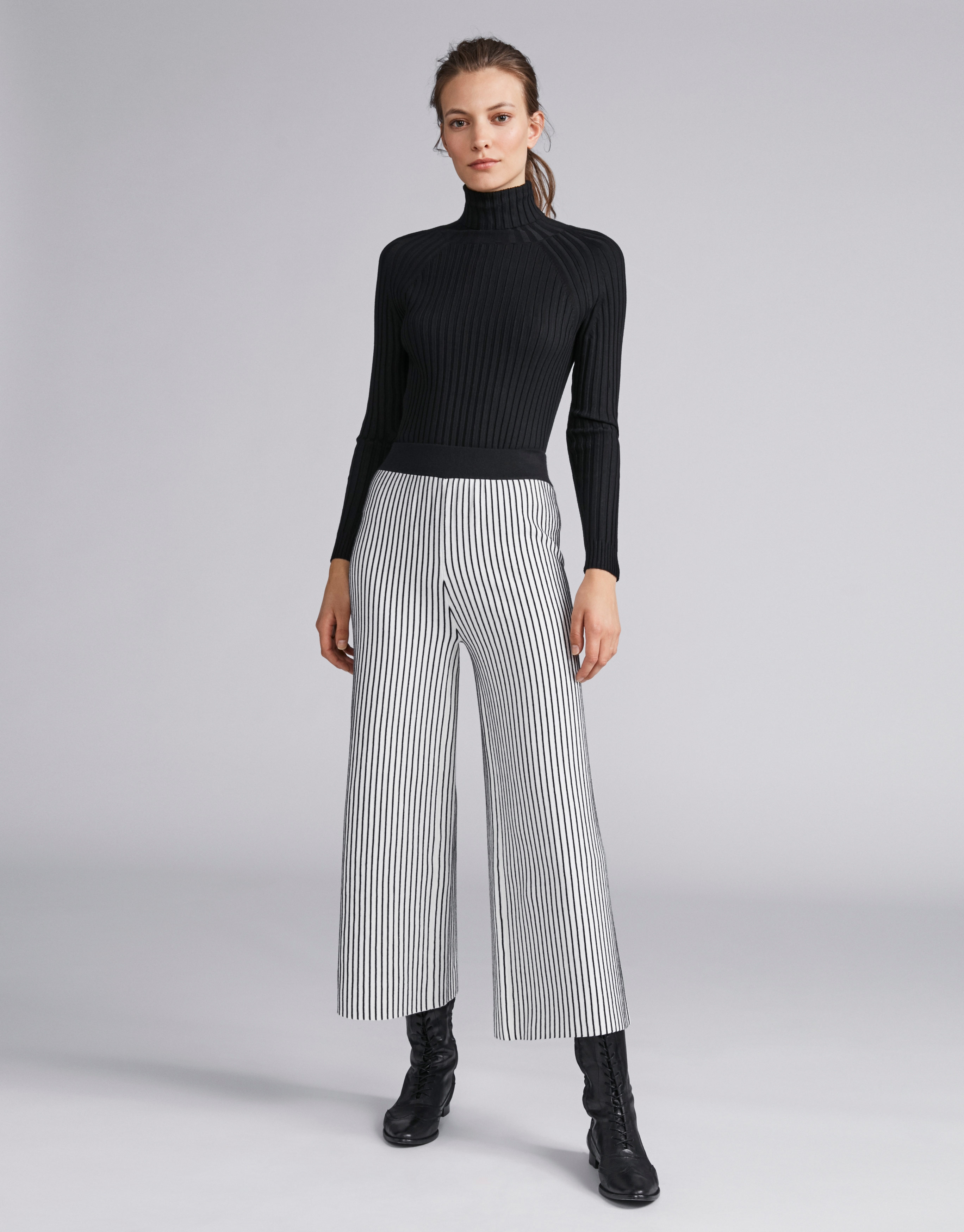 Black ribbed sweater with turtle neck