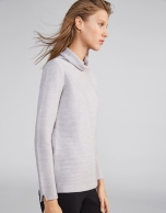 Silver sweater with design and slits on sleeves