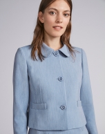 Light blue short fitted jacket