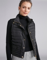 Black quilted vest