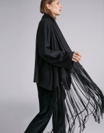 Black cape-effect jacket with fringe