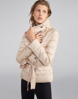 Beige quilted ski jacket with belt