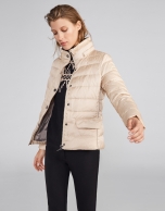 Beige quilted ski jacket with belt